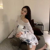 Blusa de verano transparente de malla con estampado de mariposas